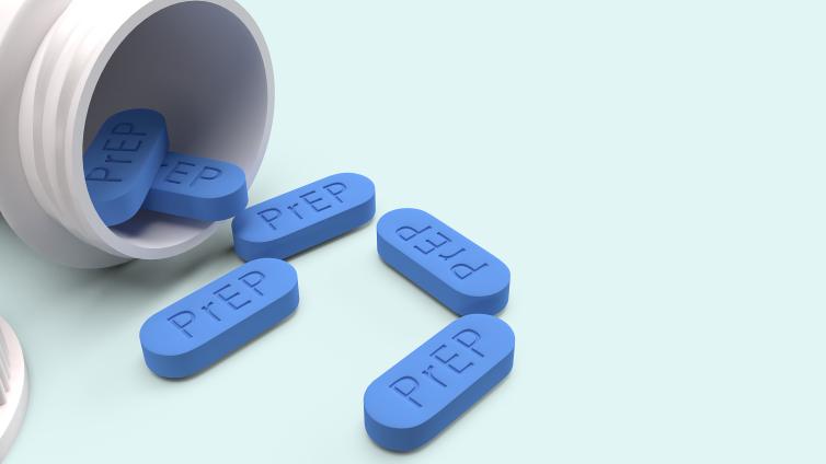 PrEP pills falling out of bottle