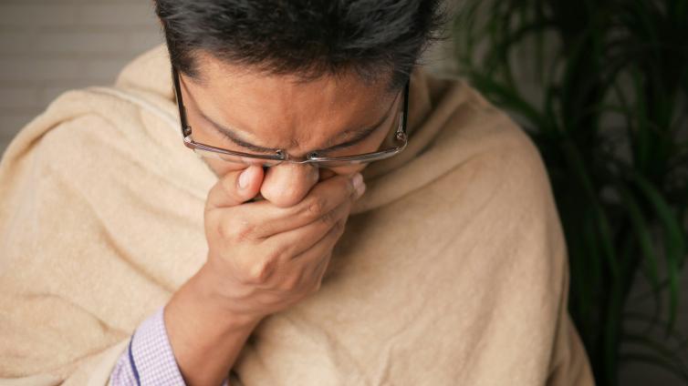 Person sneezing